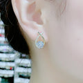 Gold Tone Crisscross Drop Earrings With Clear Round Stones view 4