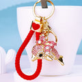 Jeweled Bow Dolphin Keychains in Pink and Blue with Bare Wrist Loops view 1