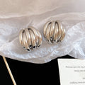 Layered Ribbed Metal Dome Stud Earrings in Two Finishes view 6