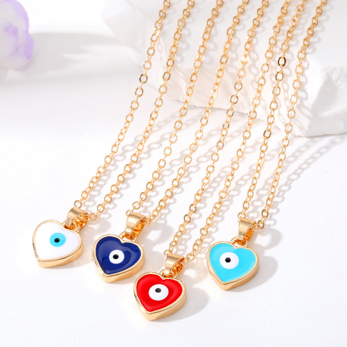 Gold Tone Heart Evil Eye Pendant Necklaces in Four Colors