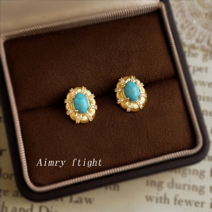 Gold Tone Turquoise Oval Stone And Textured Floral Halo Stud Earrings