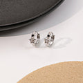 Silver Star Huggie Hoop Earrings Black Enamel Crystal Stars view 1