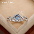 Blue Round Solitaire Wave Ring In Polished Silver Tone view 5