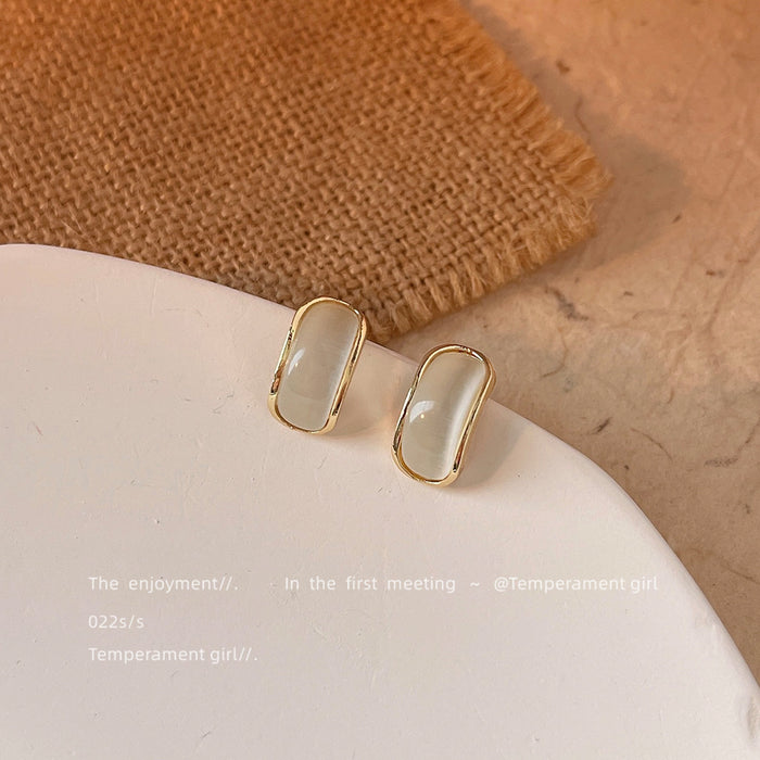 Gold Capsule Cat Eye Stud Earrings Cream White Stones