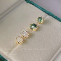 Gold Tone Round Faceted Stone Stud Earrings In Green And Ivory view 4