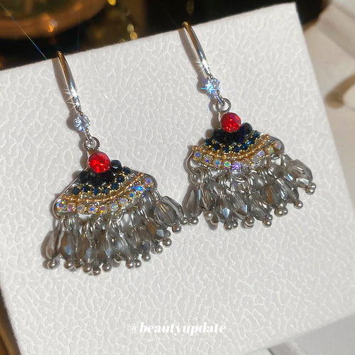 A display view of the beaded fan drop earrings.