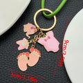 Pink and Blue Baby Elephant Bottle and Footprint Charm Keychain Pair view 6