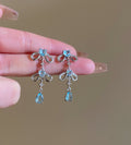 Silver Bow and Blue Crystal Drop Earrings for Everyday Styling view 6