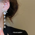 Crystal Bow Pearl Tassel Earrings With Polished Metal Tone Details view 3