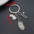 Two Silver Tone Syringe Stethoscope and Heart Keychains view 7
