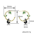 Gold Tone Panda Bamboo Hoop Earrings In A Polished Decorative Design view 5