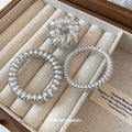 Silver Metallic Spiral Coil Hair Tie In The Listed Medium Style view 3