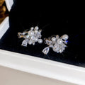 Pearl Cluster Floral Dangle Clip On Earrings With Polished Metal Details view 7