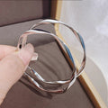 Silver Tone Large Wavy Hoop Earrings With Polished Finish view 5