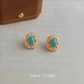 Gold Tone Turquoise Oval Stone And Textured Floral Halo Stud Earrings view 3