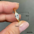 Marquise Clear Solitaire Flush-Set Ring In Polished Gold Tone view 4