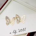 Gold Crystal Butterfly Stud Earrings Openwork Cutout Wings view 2