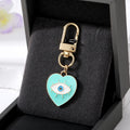 Gold Tone Heart Enamel Lash Evil Eye Clip Keychains view 2