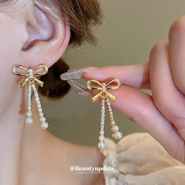 Gold Tone Bow Stud Earrings With Pearl Chain Tassels