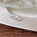 Clear Stone Bow Open Rings In Silver And Gold Tone view 6