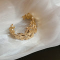 Gold Tone Wide Openwork Bracelet With Layered Textured Flowers And Leaves view 6