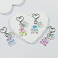 Gradient Transparent Teddy Bear Heart-Clasp Charms in Five Color Options view 1