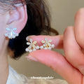 Floral Pearl Clip-On Earrings in Silver and Gold with Polished Metal Details view 2
