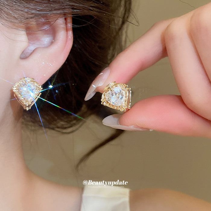 Gold Tone Heart Crystal Huggie Earrings With Decorative Details