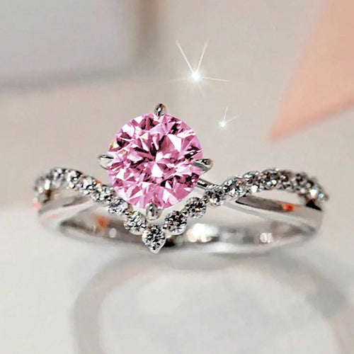 Silver-tone V-band ring with pink round center stone