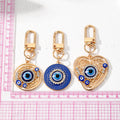 Gold and Silver Tone Heart Evil Eye Clip Keychains view 5