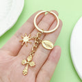 Celestial Charm Keychains Featuring Sun Across 22 Pictured Variations view 1