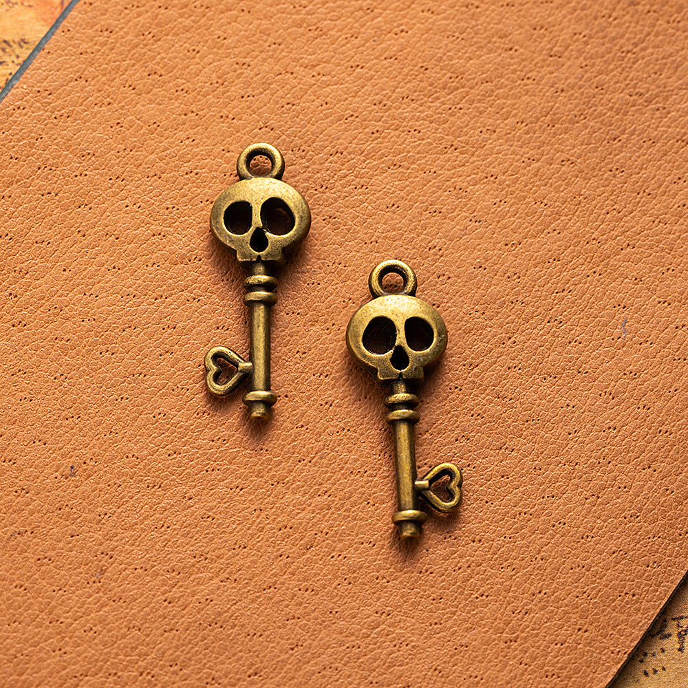 Vintage Punk Skull Key Alloy Charm Pendant 26x9mm