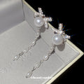 Crystal Bow Pearl Tassel Earrings With Polished Metal Tone Details view 4
