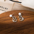 Gold and Silver Gourd Outline Pearl Look Stud Earrings view 4