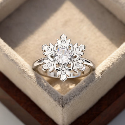 Front face silver snowflake clear CZ ring on beige cushion
