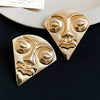 Gold Tone Face