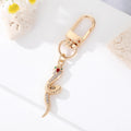 Gold Tone Sculpted Snake and Cobra Shape Clip Keychains view 4