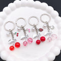 Twelve Resin Cherry Strawberry and Peach Metal Keychain Designs view 4