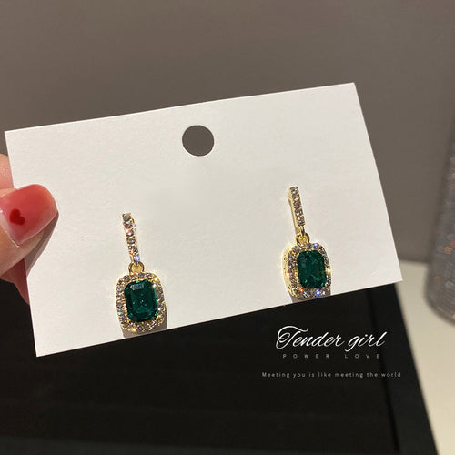 Front view of green rectangular crystal drop earrings fashion jewelry accessories