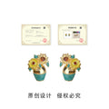 Gold Tone Sunflower Pot Earrings In Clip On And Stud Styles view 3