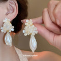 White Floral Pearl Stud and Hoop Earrings in Fourteen Styles view 1