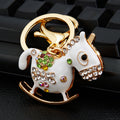 Mixed Rocking Horse Swan Peacock and Cross Keychains in Eight Designs view 1