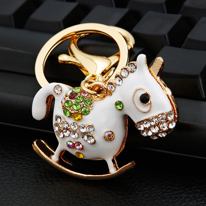 Mixed Rocking Horse Swan Peacock and Cross Keychains in Eight Designs