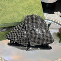 Black Rhinestone Fabric Triangle Claw Hair Clip with Polished Metal Details view 1