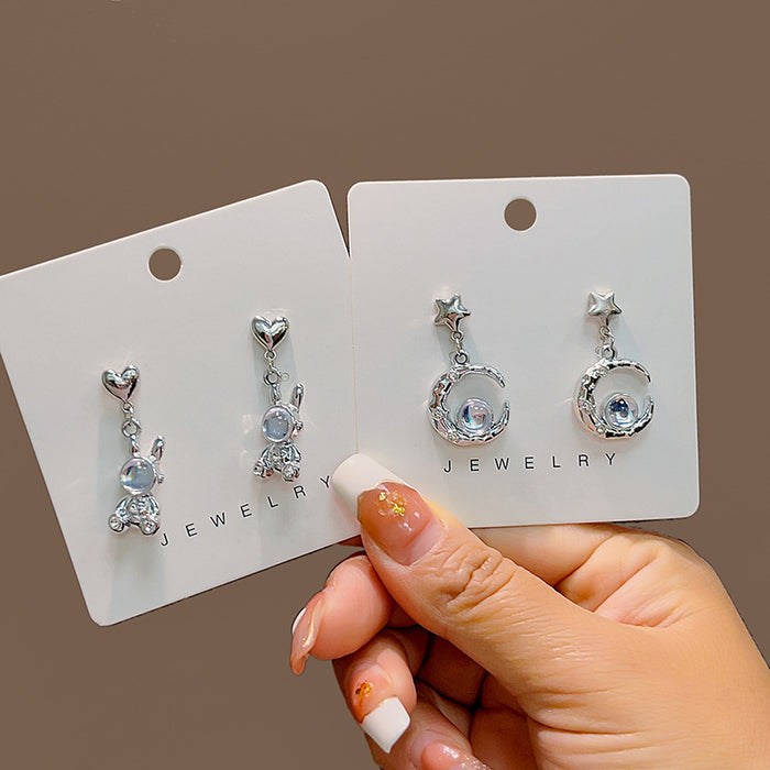 Silver Tone Moon and Astronaut Novelty Dangle Earrings