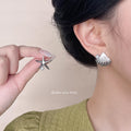 Silver Asymmetric Starfish Shell Pearl Stud Earrings Pair view 1