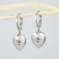 Silver Tone Cone Spike and Dinosaur Huggie Drop Earrings view 4