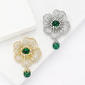 Green Center Flower Brooch With Hanging Bead With Polished Metal Detail view 1