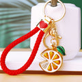 Mixed Jeweled Lemon Slice and Large Red Apple Keychains in Three Options view 1