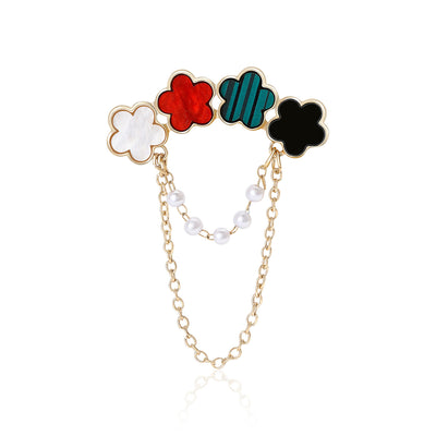 Front product view of the four flower brooch on a light background